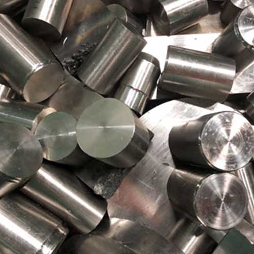 very short shiny round cylindrical blocks of Inconel metals.Shop Online 